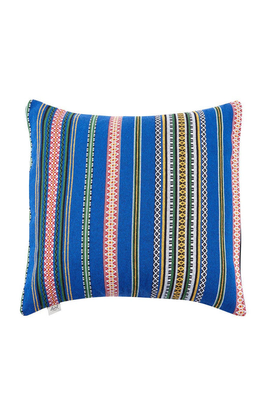 The Eturel Madrid Blue Pomegranate Cushion Cover (50cmx45cm) features a vibrant blue base with Alhambra-inspired colorful horizontal stripes and geometric patterns in pink, green, yellow, black, and white.