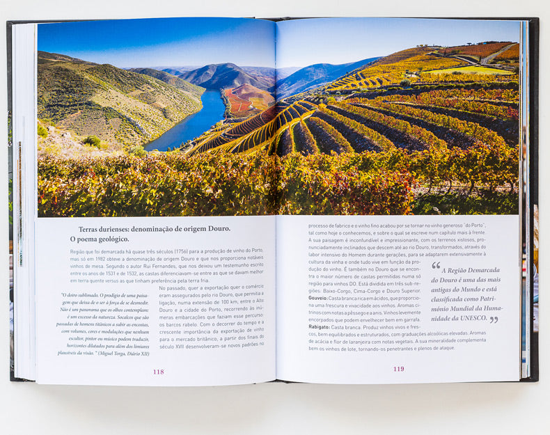 An open Bread, Olive Oil & Wine by ObjectoAnonimo shows terraced vineyards by a winding river, with Portuguese and English text on facing pages about bread and olive oil in the Mediterranean diet.