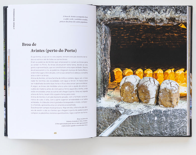 An open book from ObjectoAnonimo, titled Bread, Olive Oil & Wine, displays text about Broa de Avintes beside a photo of loaves baking in a traditional stone oven with a bread peel, celebrating this Mediterranean staple.