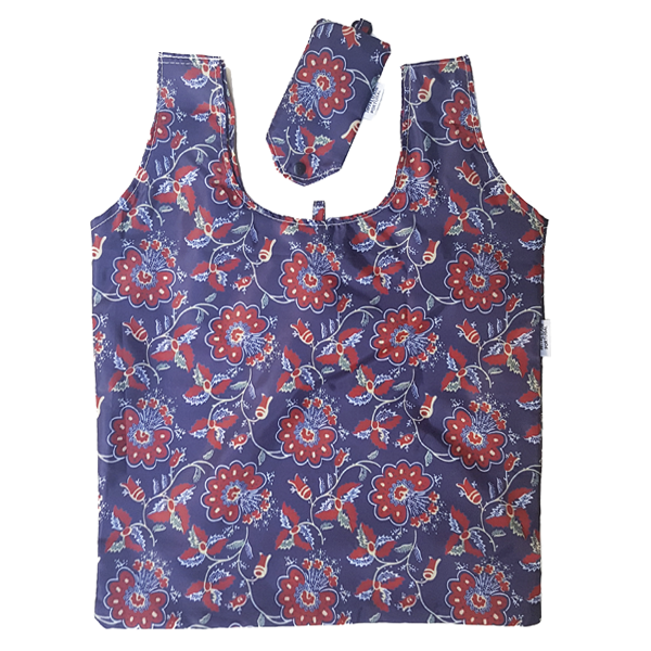 The Terra Lusa “Chita” From Alcobaça Eco Shopper features a red and white floral print on dark blue, plus a matching storage pouch—ideal for stylish, sustainable shopping.