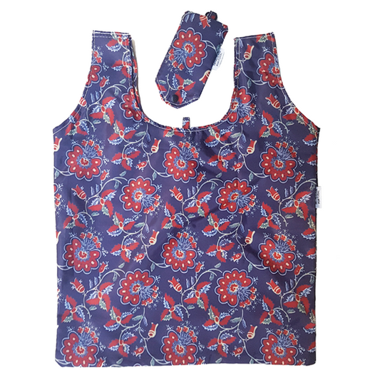 The Terra Lusa “Chita” From Alcobaça Eco Shopper features a red and white floral print on dark blue, plus a matching storage pouch—ideal for stylish, sustainable shopping.