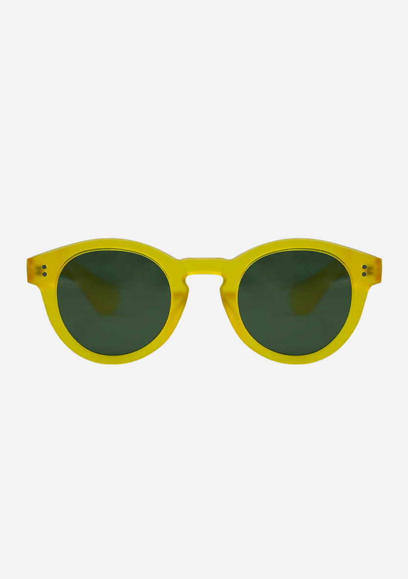 The Oceanides Sunglasses (Polarized) - Rodea Yellow Frosted feature an eco-friendly yellow round frame with dark green lenses, made from recycled plastic, displayed against a plain white background.