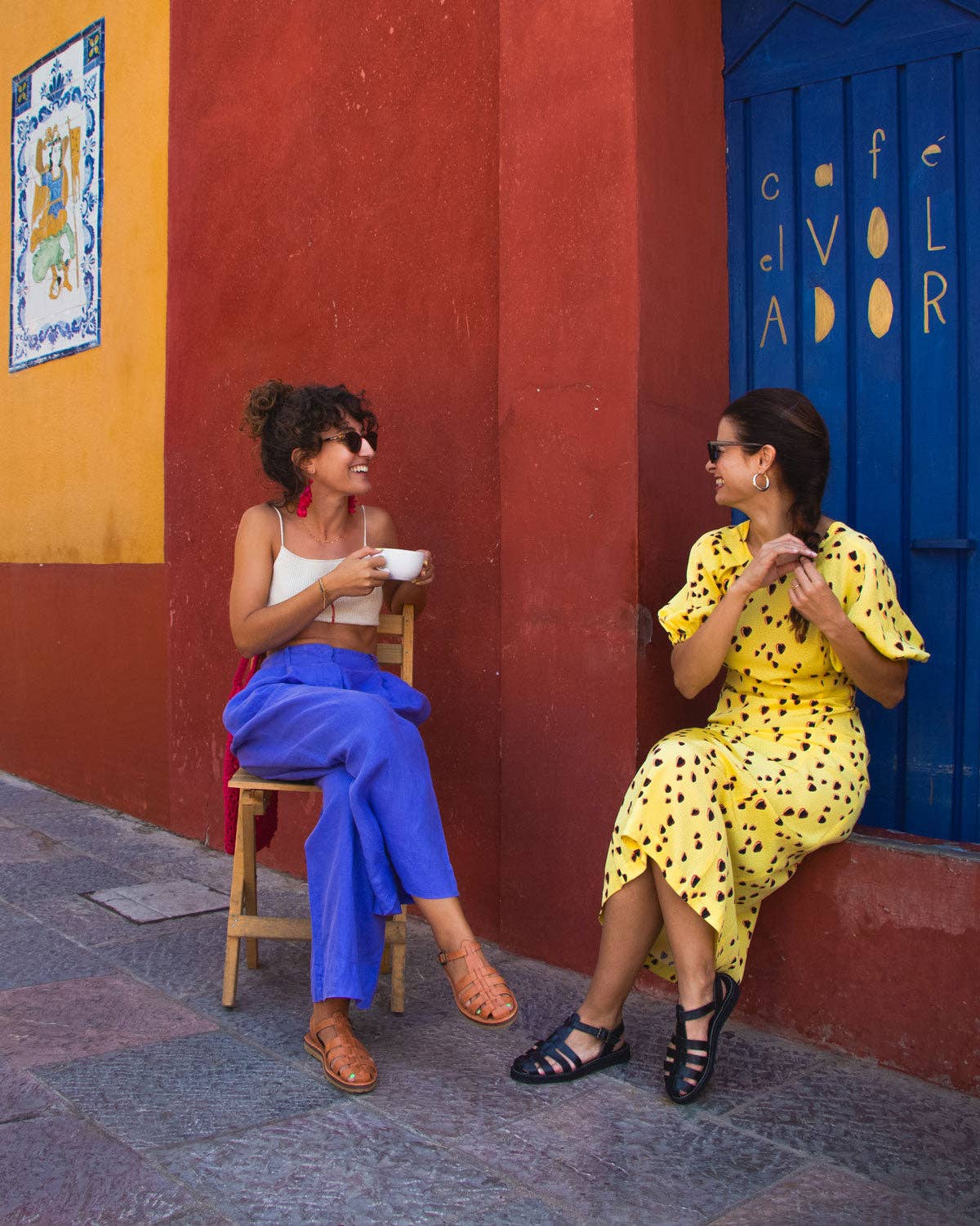 ladies in strap sandals laughing