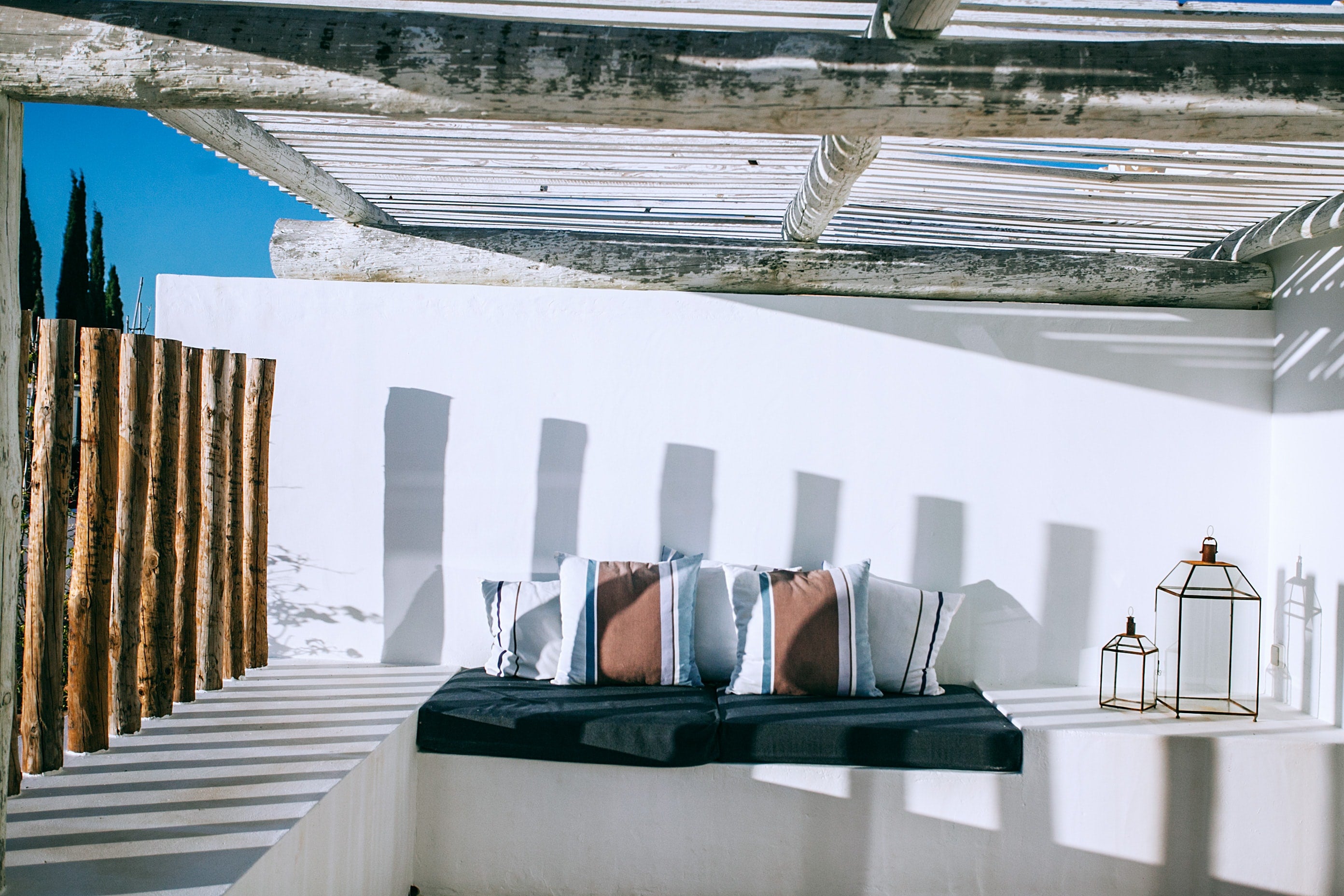 Alentejo sun deck with day bed, cushions and lanterns