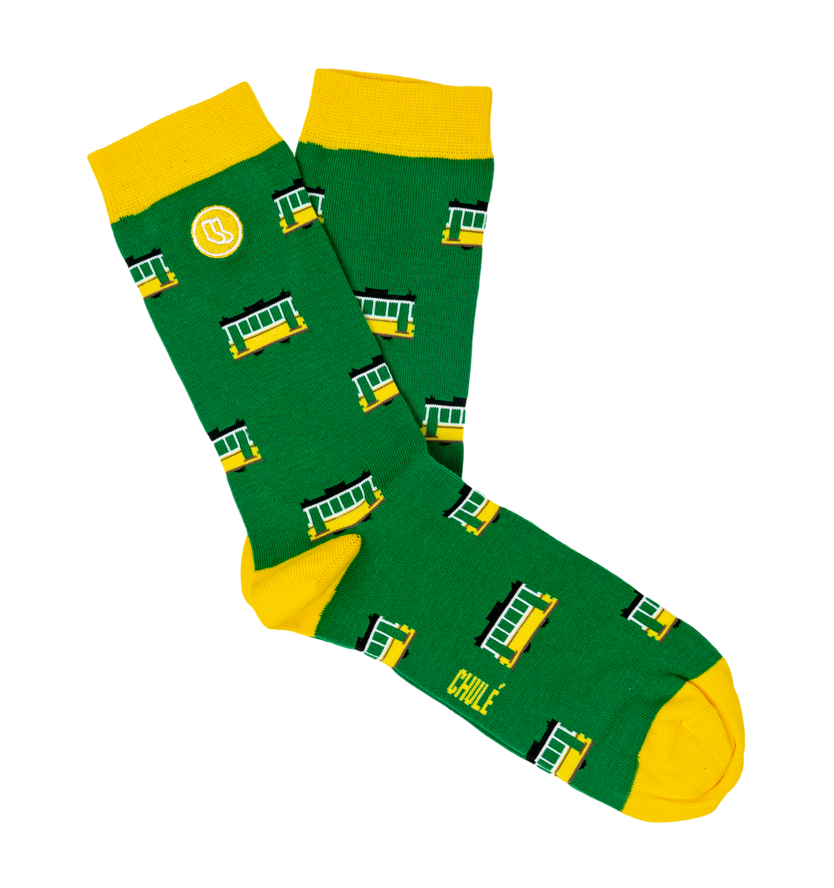 Green socks with yellow toes, heels, and cuffs, decorated with cheerful streetcars and a small logo, are included in the Lisbon Essentials Box by Iberica—Pretty things from Portugal. CHULE is printed near the toe, making them a unique Lisbon-inspired gift.
