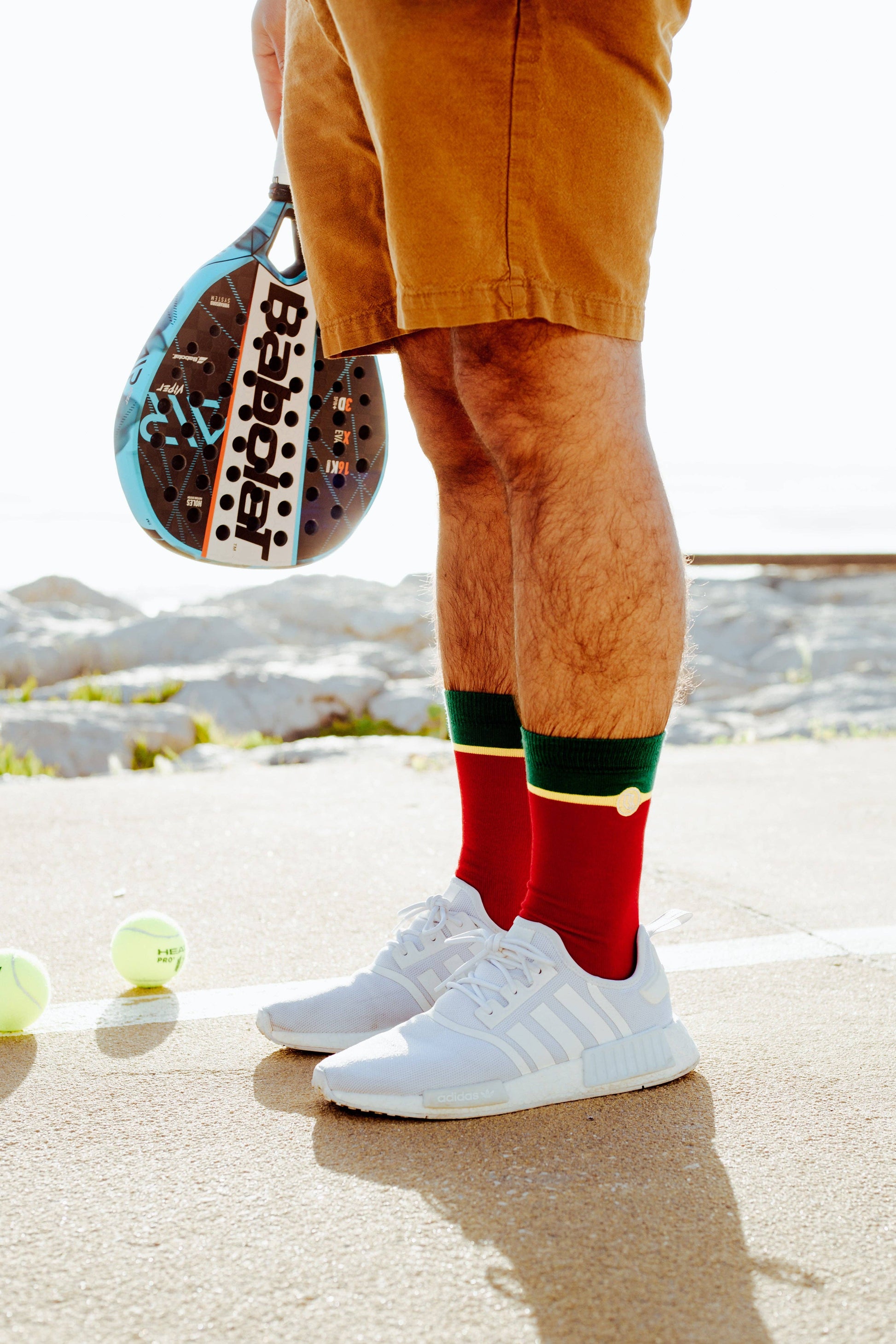 Man wearing Socks with Portugal football colours 