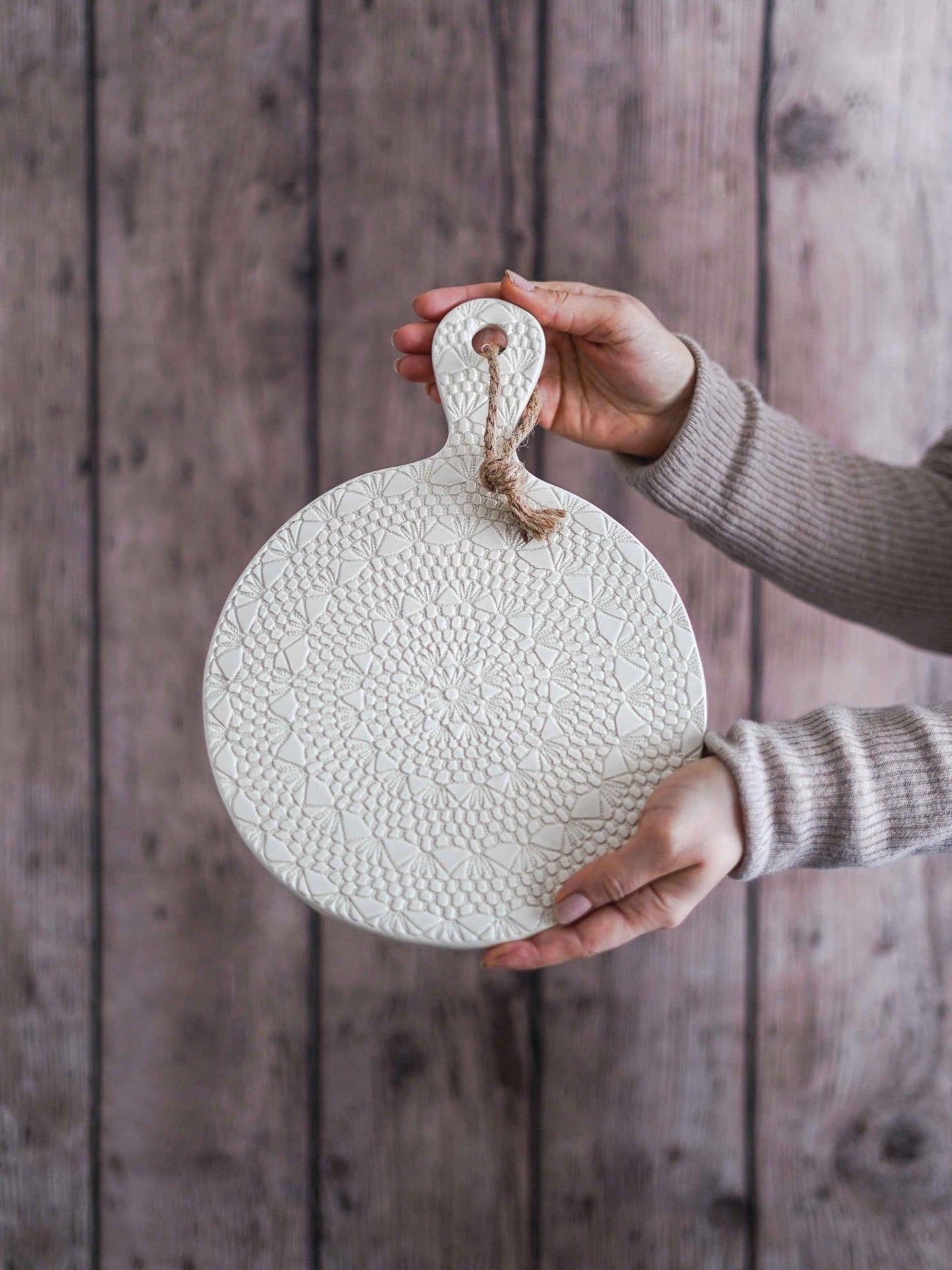 White crochet ceramic board