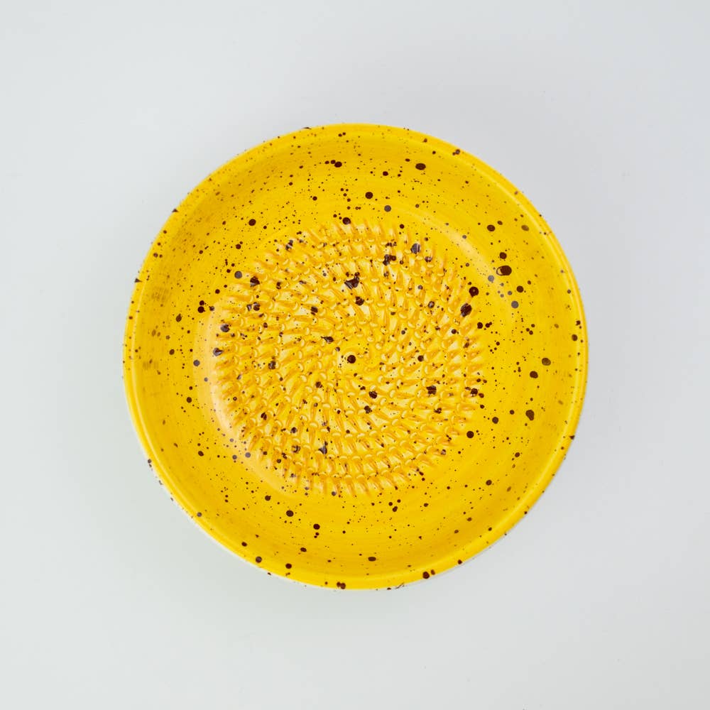 yellow and white grater bowl