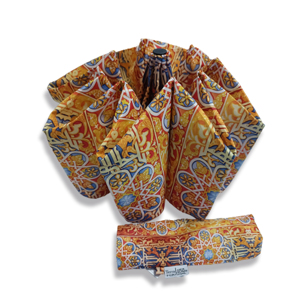 stained glass umbrella closed with a close up view of the design