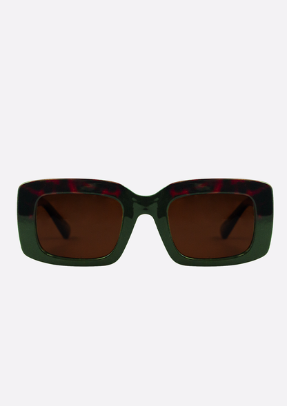 Front view of Oceanides Sunglasses (Polarized) - Ida Tortoise Green Brown with thick dark green frames and brown polarized UV400 lenses, shown against a plain white background.