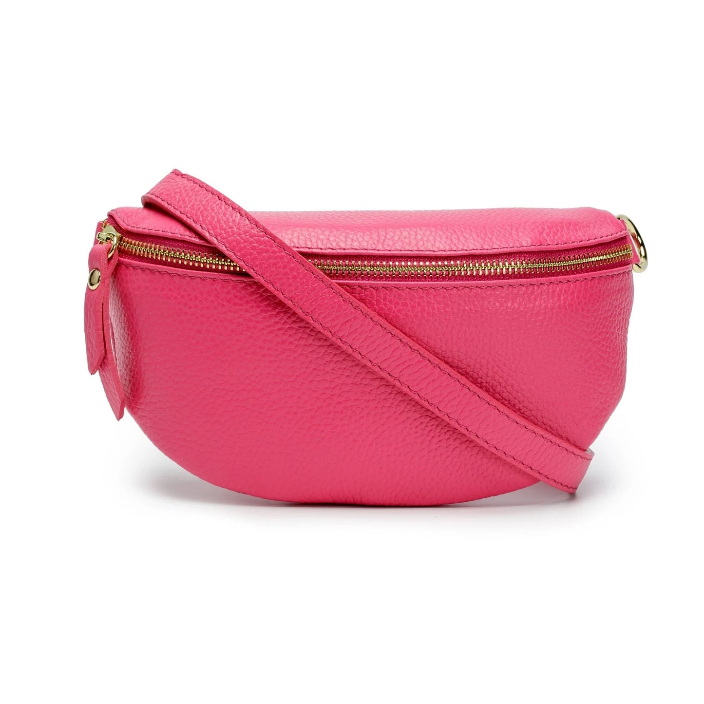 The Cassette Barcelona Leather Fanny Pack Crossbody Bag features bright pink textured leather, a gold zipper, and a matching adjustable strap for a playful update on the classic style, shown against a white background.