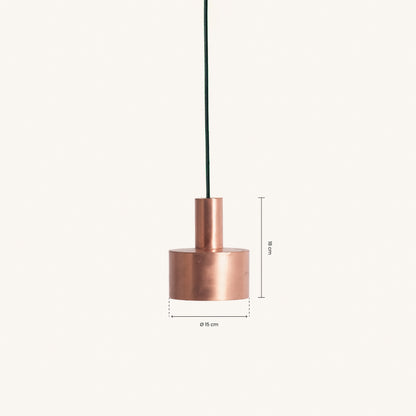The Hannun Seber Lamp features a minimalist cylindrical pendant, available in 3 colours, and hangs from a sleek cord. Ideal for industrial spaces, it measures 18 cm high with a 15 cm diameter.