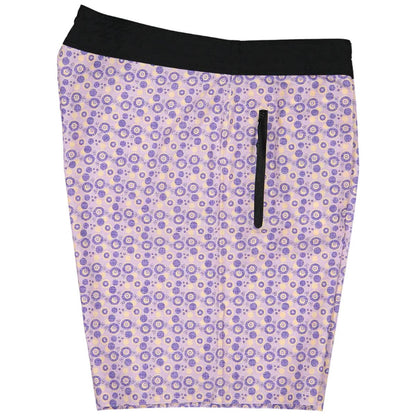 Futah Vortex Mocha men's swim shorts with repeating violet and blue circular pattern