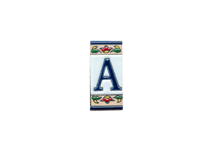 Mini Chilli Ceramic House Number & Letter Tile featuring a blue letter A on a rectangular handcrafted tile, framed by decorative red, green, and blue floral patterns.