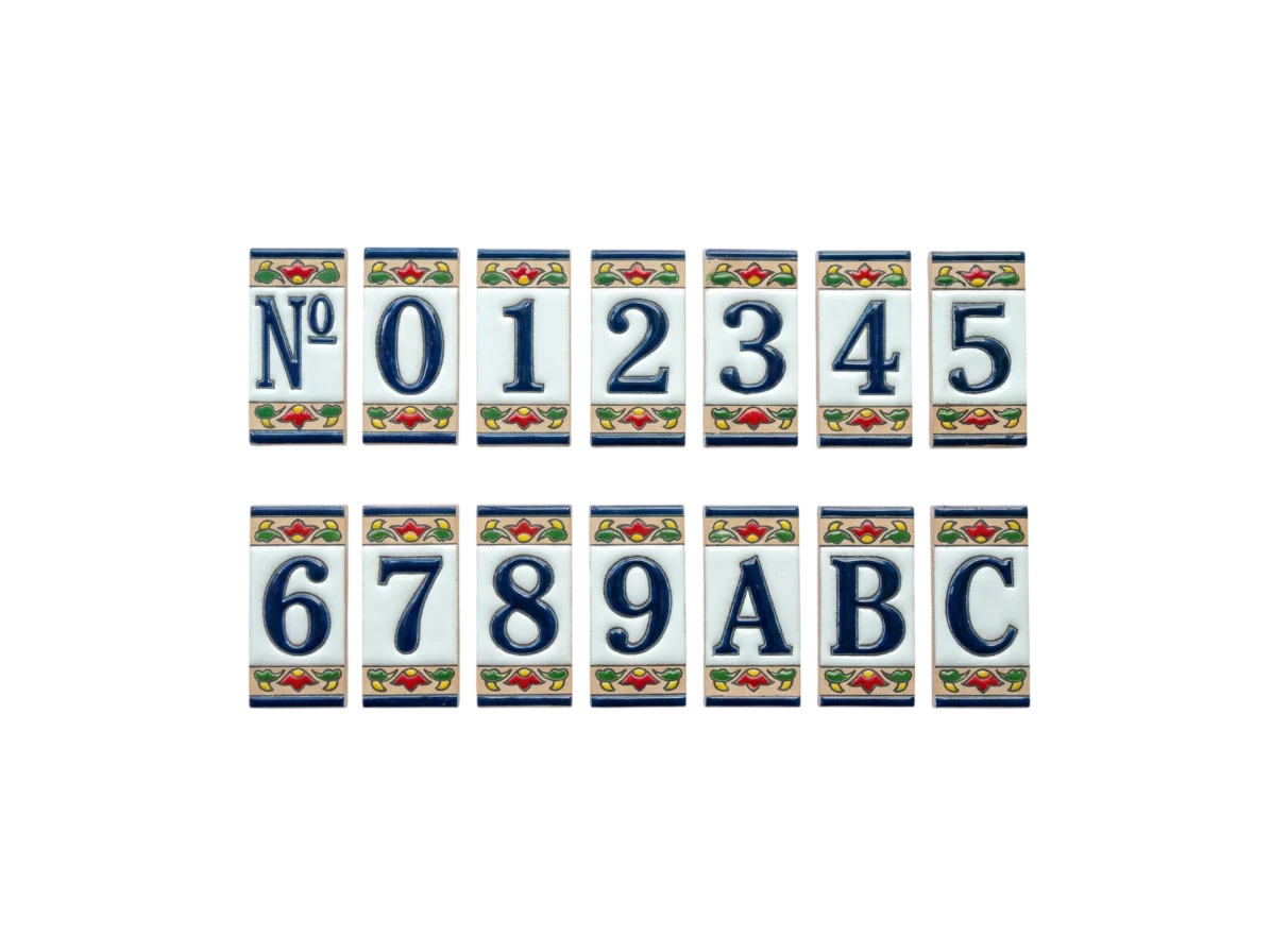 Mini Chilli Ceramic House Number & Letter Tile: rectangular handcrafted Spanish tiles featuring blue numbers 0–9, letters A–C, and a No symbol, each decorated with a red and green chili motif.