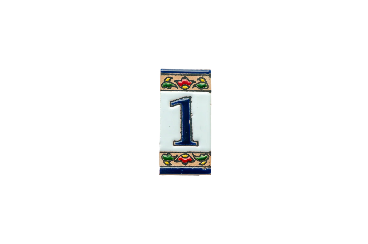 Mini Chilli Ceramic House Number & Letter Tile displaying the number one in dark blue, bordered by a floral pattern with red, green, and yellow details.