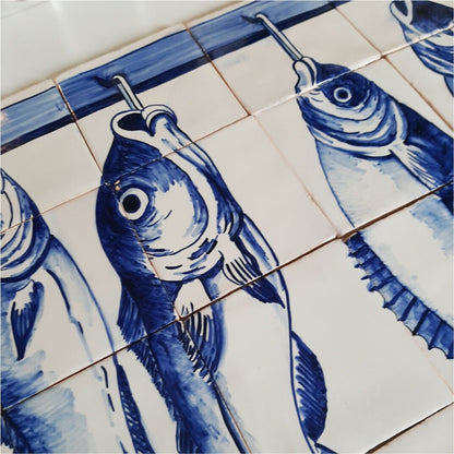 Hand painted Portuguese tile with fish on a hook